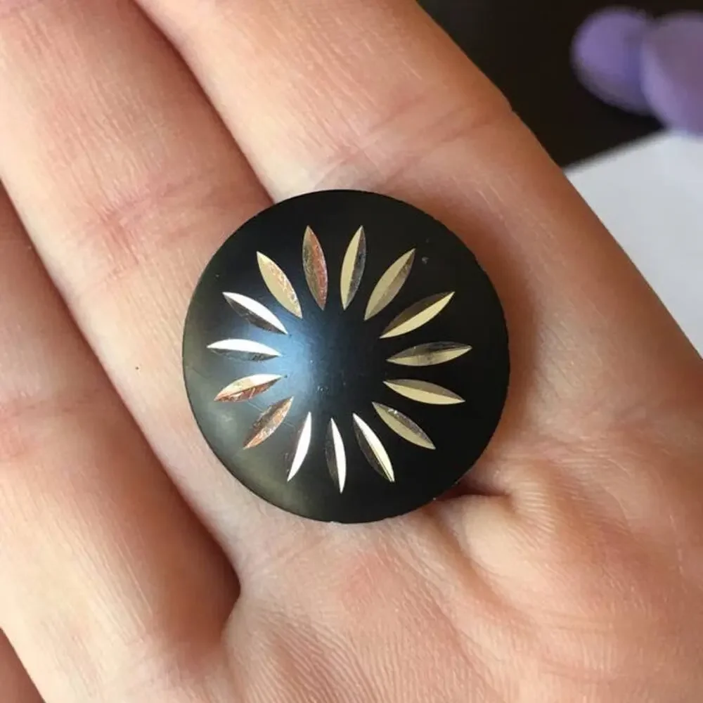 Laser cut black and silver metal post earrings